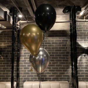Bunch of three helium filled 30cm latex balloons
