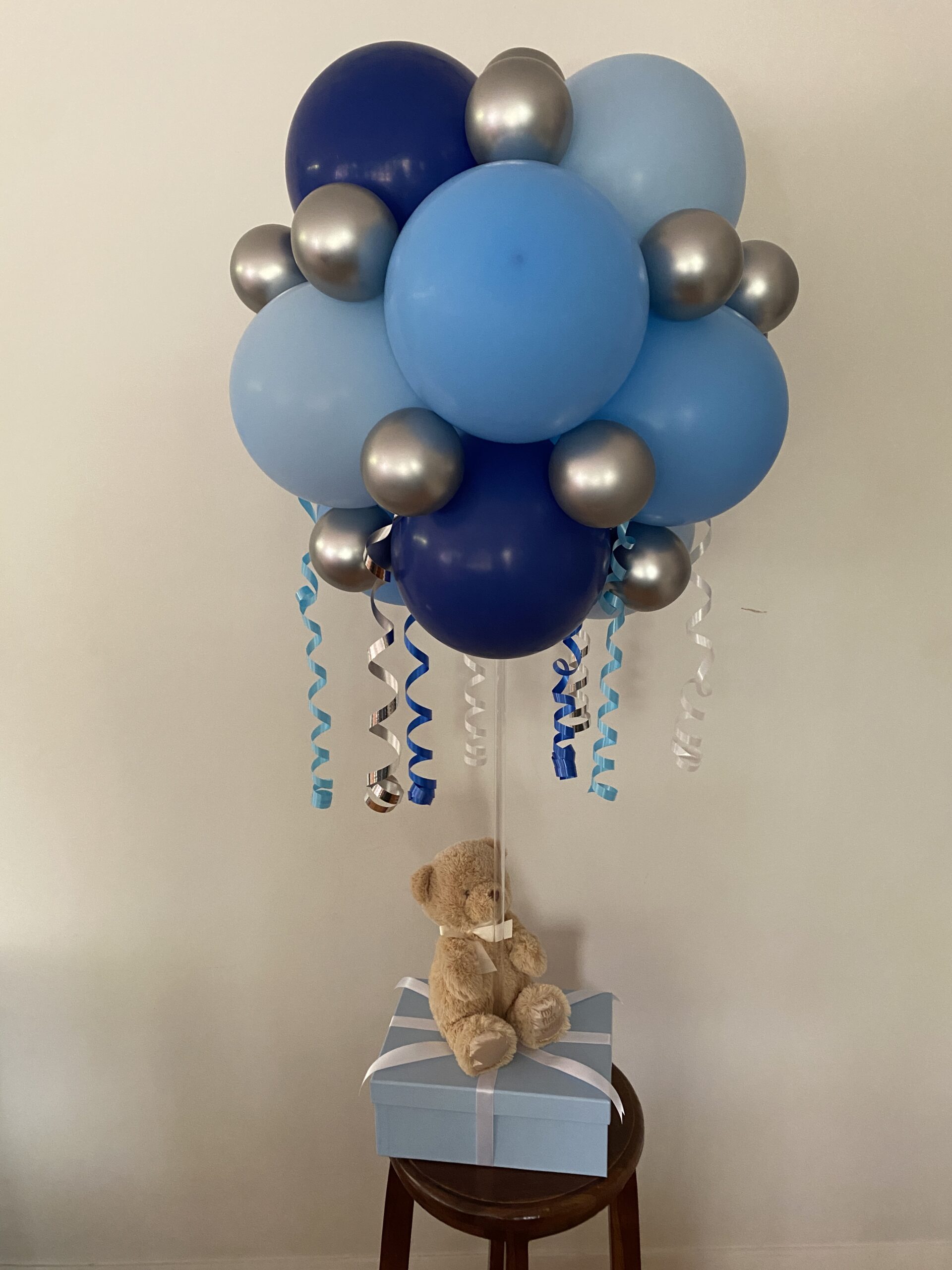 Teddy on a box baby arrangement